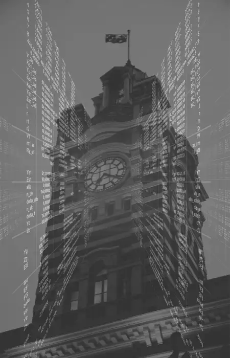 Programming code overlaying Melbourne cityscape