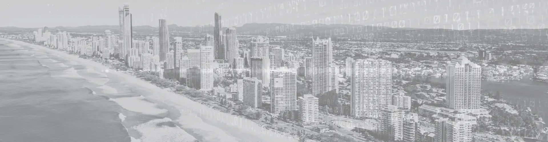 Programming code with Gold Coast skyline